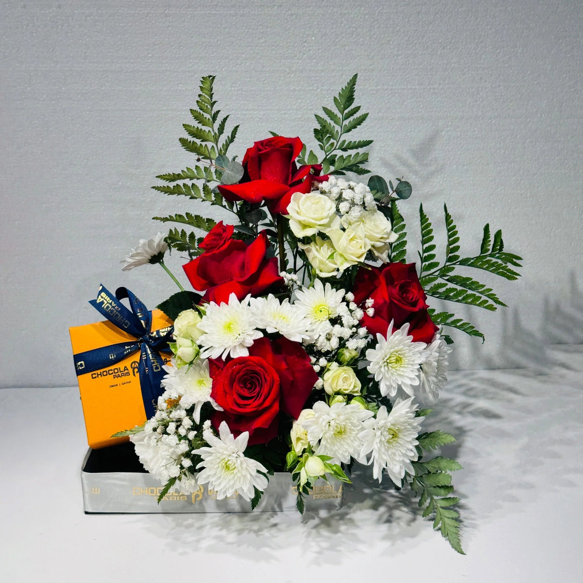 Vibrant Flower Arrangement and Belgian chocolate Box Combo